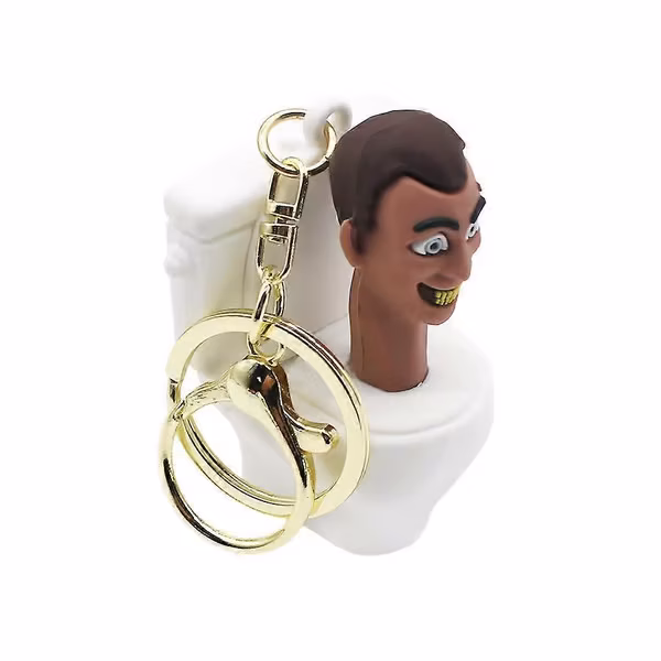 4 stk Skibidi Toalett Nøkkelring Tegneserie Anime Figur PVC Nøkkelring Morsom Bilveske Henger Tilbehør For Barn Bursdagsgave