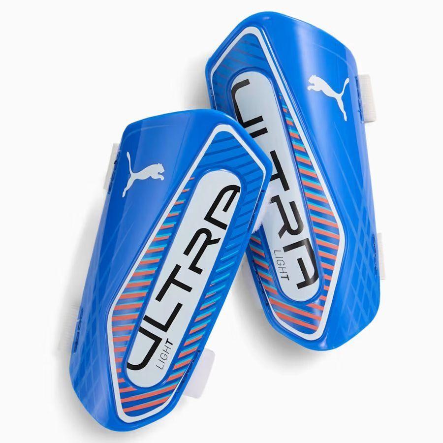 PUMA PUMA Leggbeskyttere Ultra Light Strap Untamed - Ultra Blue/PUMA White/rød