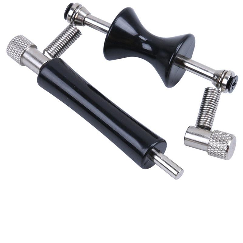 Rullende klemme for stemming av gitar Black